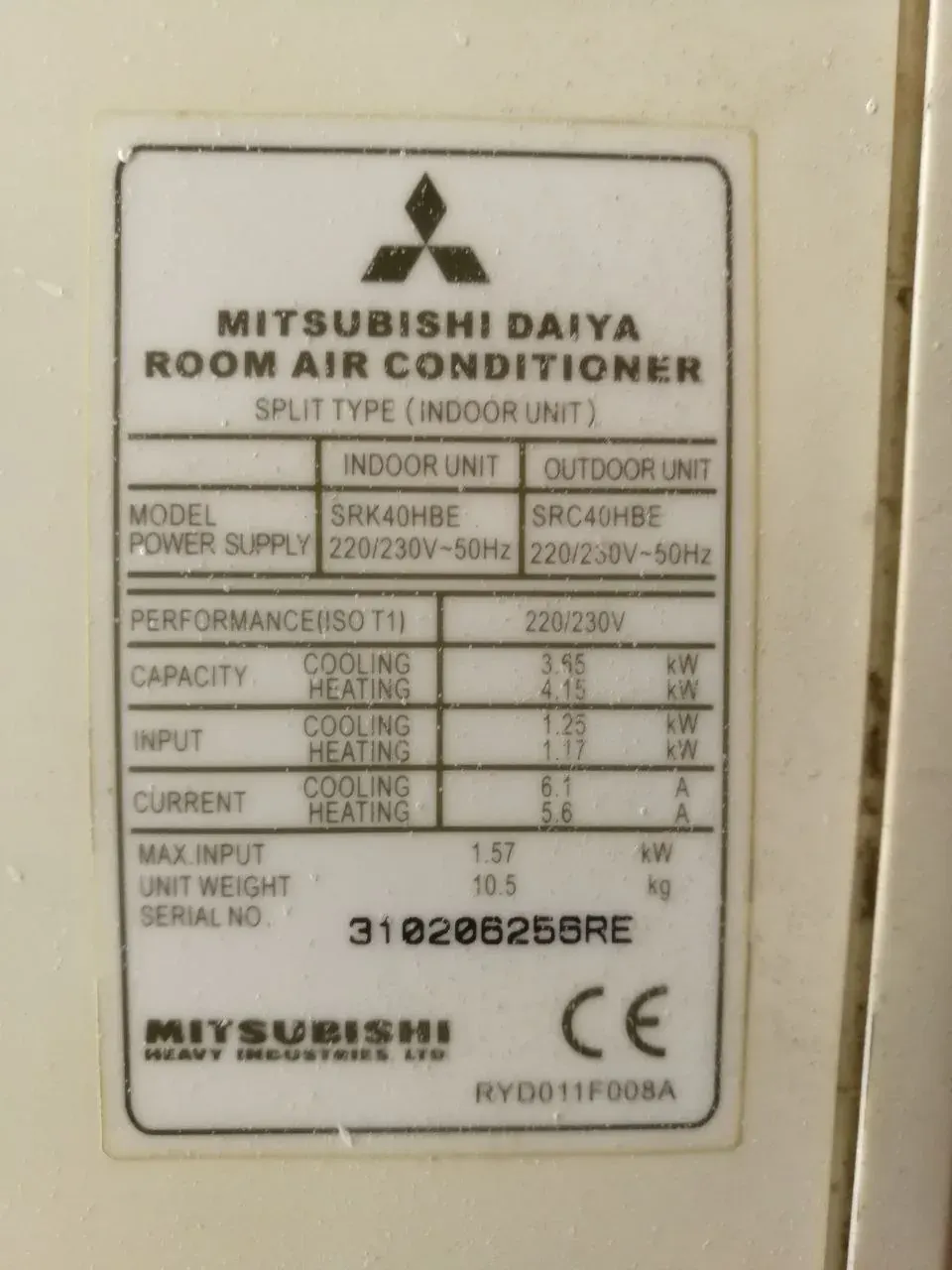 Mitsubishi split AC unit specification label with model and power supply details for an installation quote in Dubai